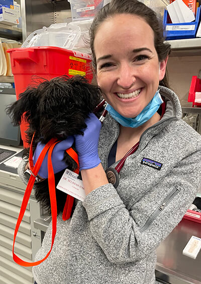 Dr. Selimah Harmon with Olive when the puppy was feeling more herself.